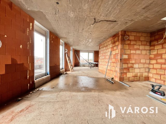 Világos, energiatakarékos otthon a Postakertben